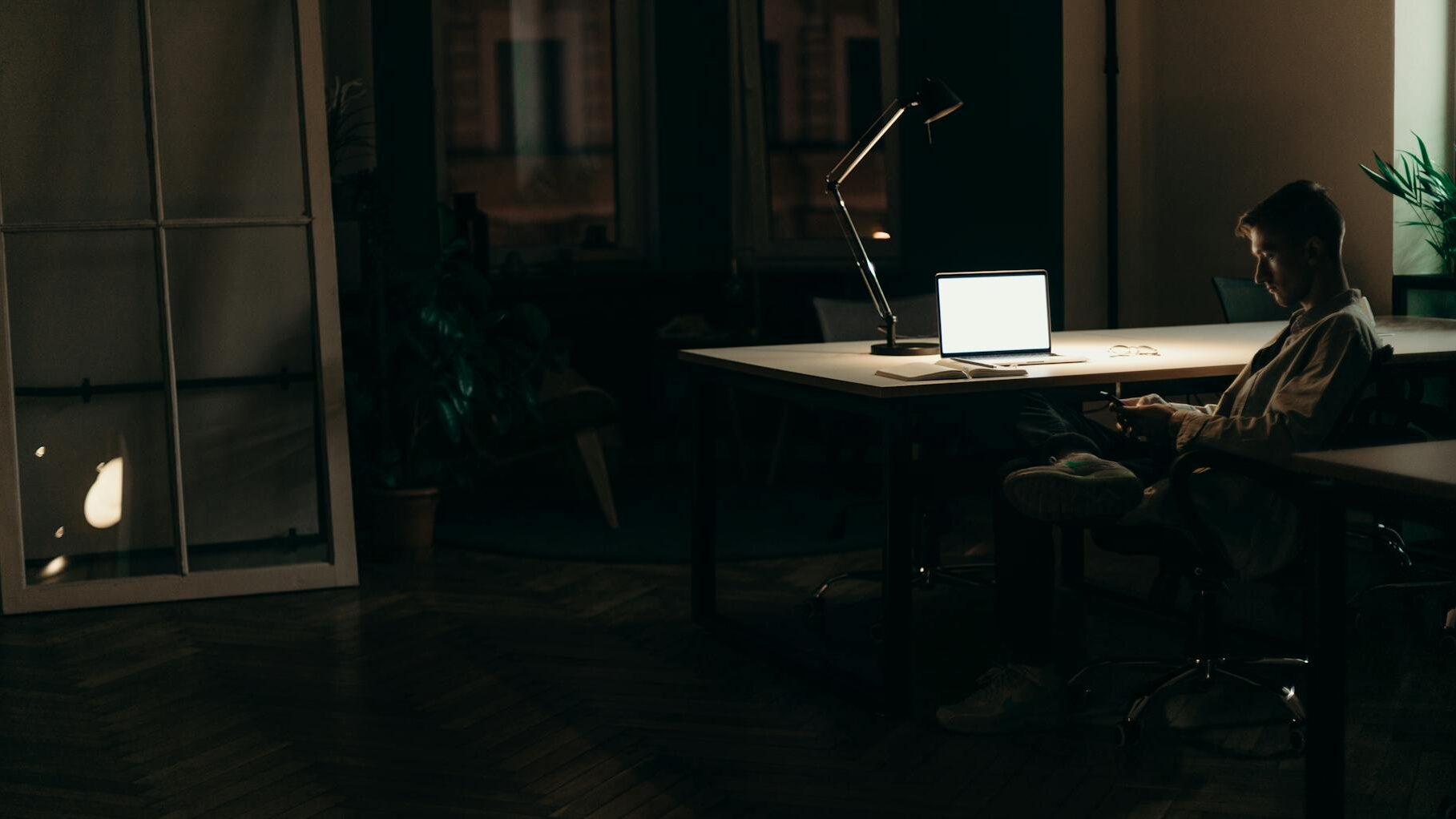 silver macbook on white table